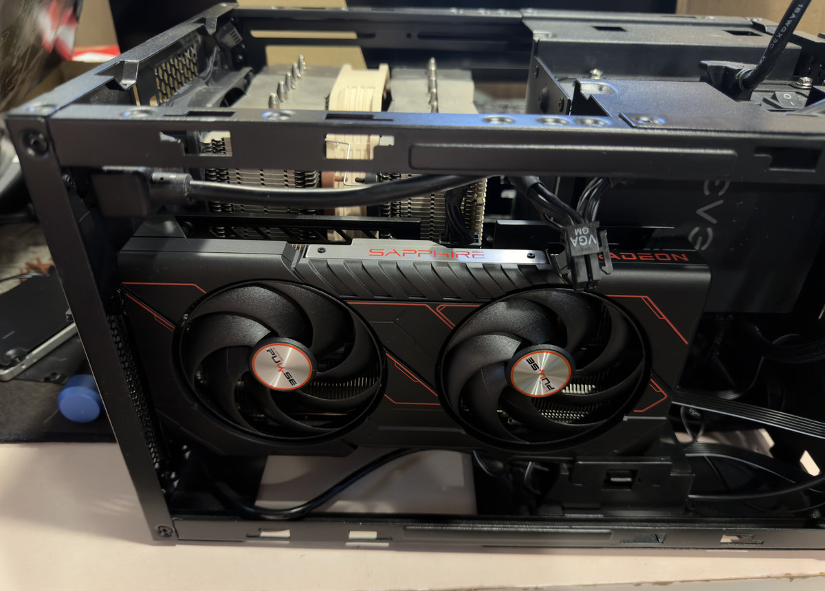 photograph of a custom PC inside a Silverstone Sugo S14 case with the side panel removed