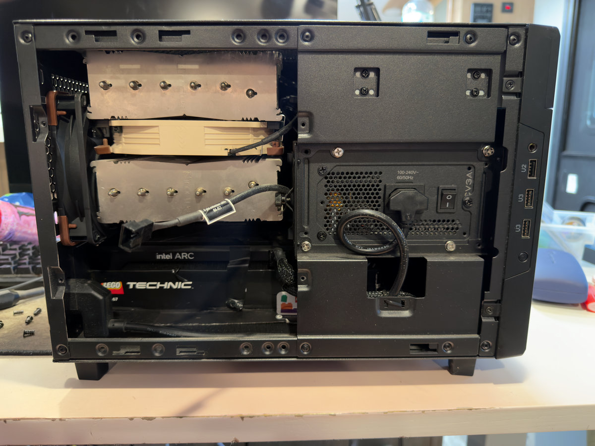 photograph of a custom PC inside a Silverstone Sugo S14 case with the side panel removed